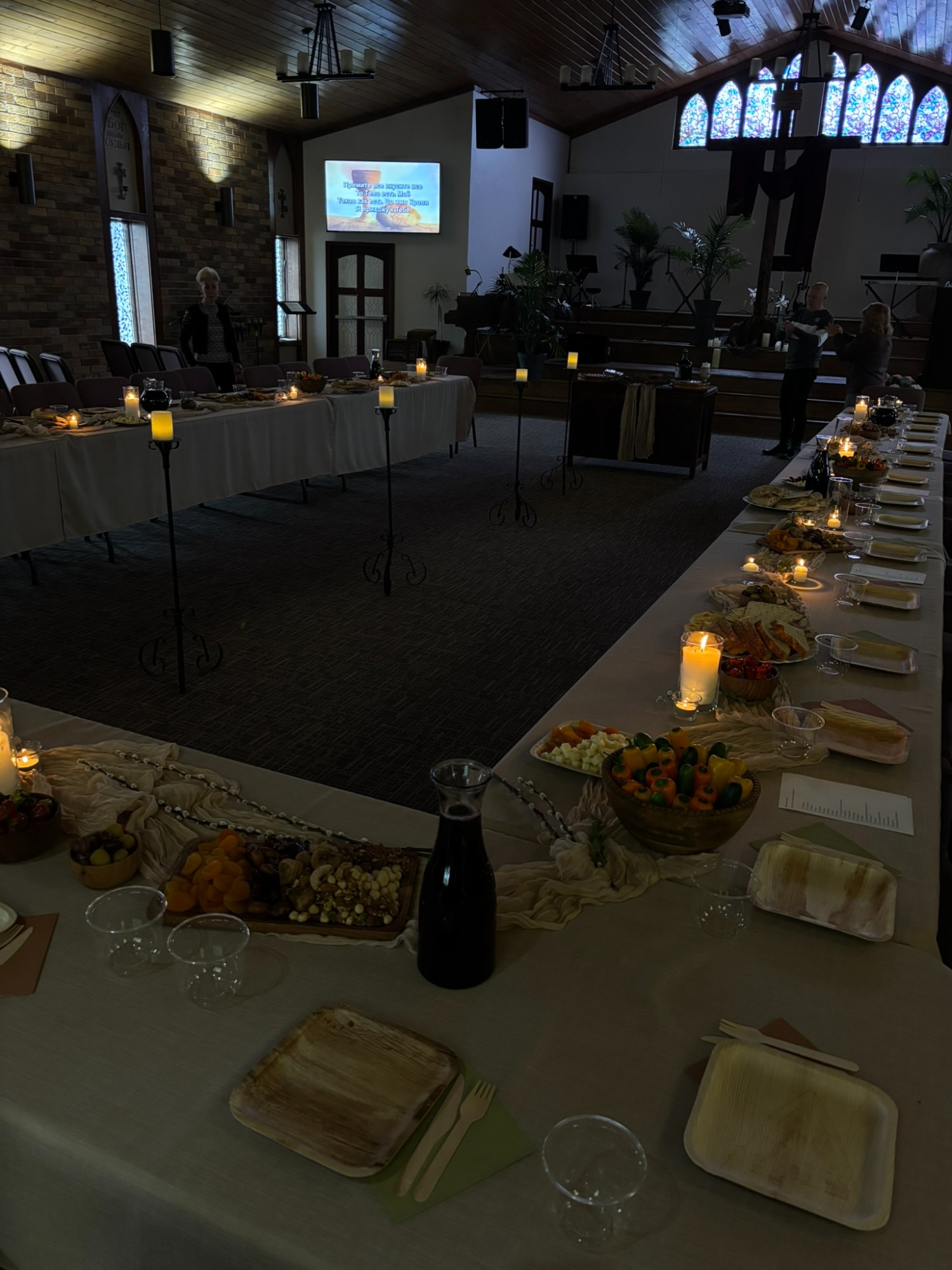 Passover seder table set with candles and food